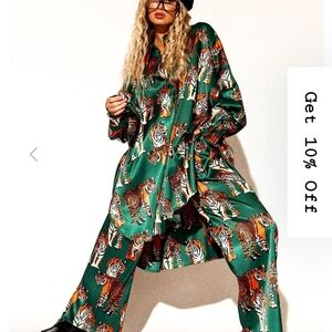 Dressed in lala satin tiger Tails set in size Sm/medium with tags attached